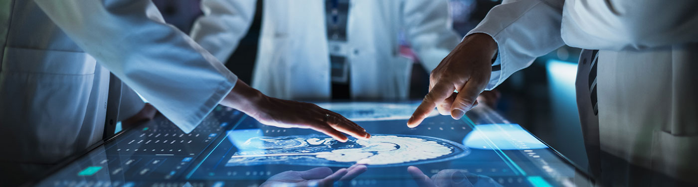 medical researchers studying mri brain scan